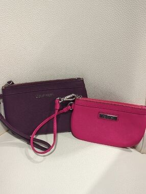 Calvin Klein Dual Pouch Wristlet in Pink and Plum